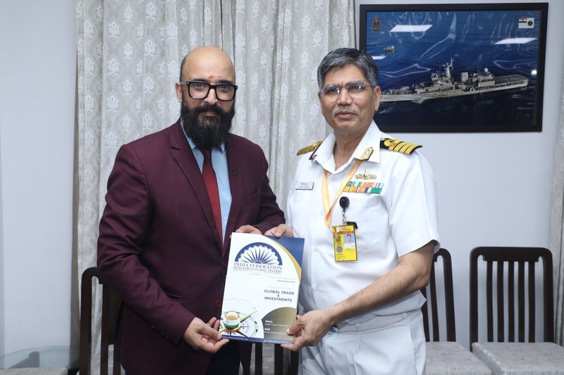 Rajat Dhar with Naval Officer — IFIGT brochure presentation at DESA, Kota House